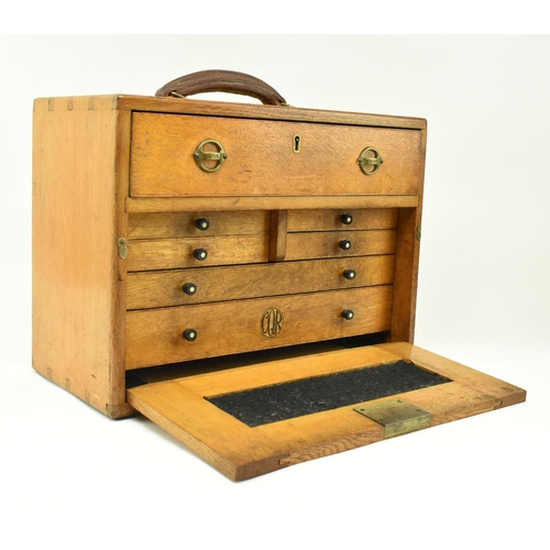 17 - A retro 20th century CQR oak engineers / workman's tool chest. The chest having a leather handle to ... 