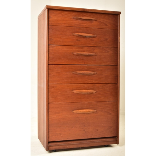 179 - Austinsuite - A retro mid 20th century teak tall chest of six drawers. The chest having a straight t... 
