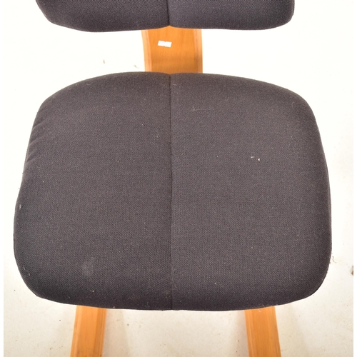 182 - Stokke - A contemporary Danish designer ergonomic rocking chair / desk chair. Padded back and seat r... 