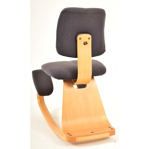 182 - Stokke - A contemporary Danish designer ergonomic rocking chair / desk chair. Padded back and seat r... 