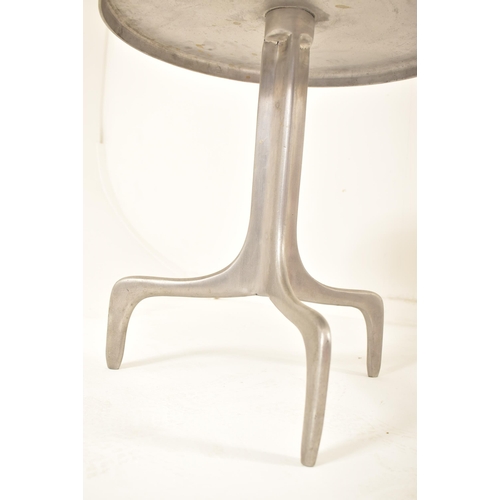 187 - A contemporary high end design cast aluminium coffee table / occasional table. The table having a ci... 