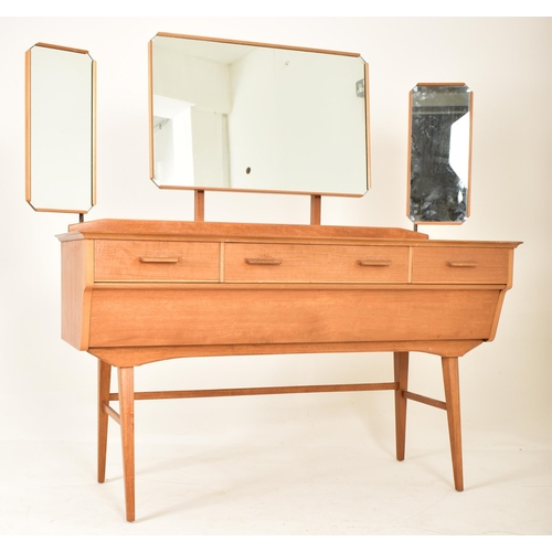 195 - Alfred Cox for AC Furniture - A retro mid 20th century British design walnut dressing table desk. Th... 