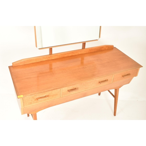 195 - Alfred Cox for AC Furniture - A retro mid 20th century British design walnut dressing table desk. Th... 