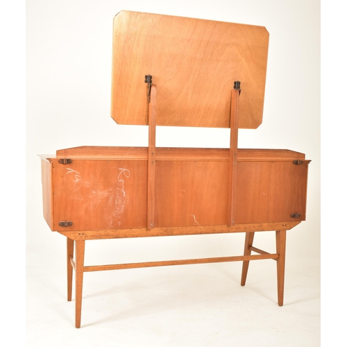 195 - Alfred Cox for AC Furniture - A retro mid 20th century British design walnut dressing table desk. Th... 