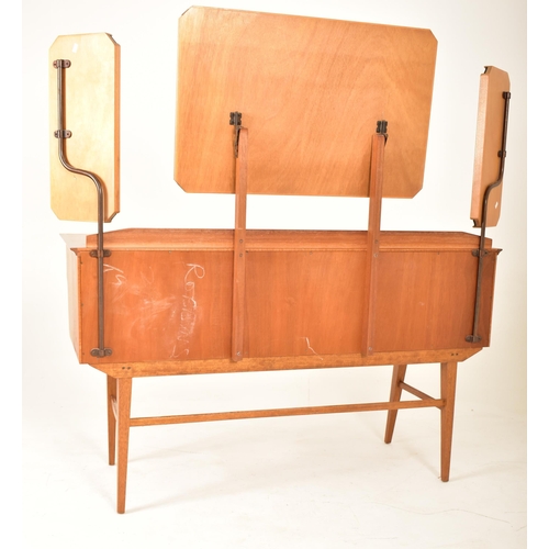 195 - Alfred Cox for AC Furniture - A retro mid 20th century British design walnut dressing table desk. Th... 