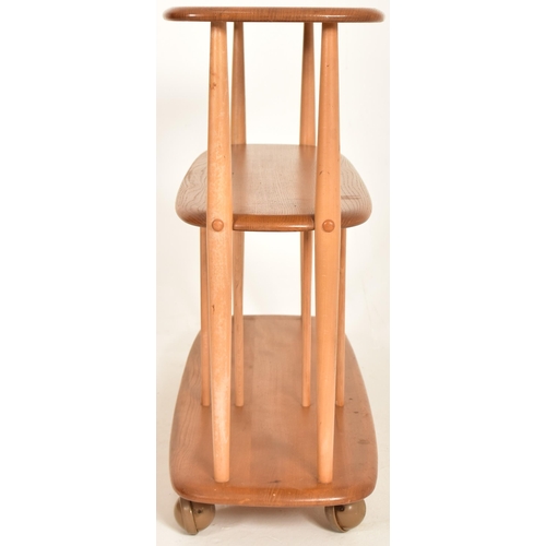 20 - Lucian Ercolani for Ercol - Model 361 - A mid 20th century beech and elm wood baby giraffe bookcase ... 