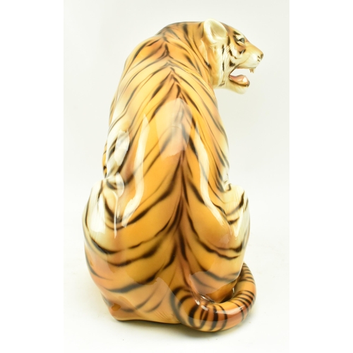 21 - A large 20th century 1960s Italian floor standing ceramic tiger. The tiger in the seated position wi... 