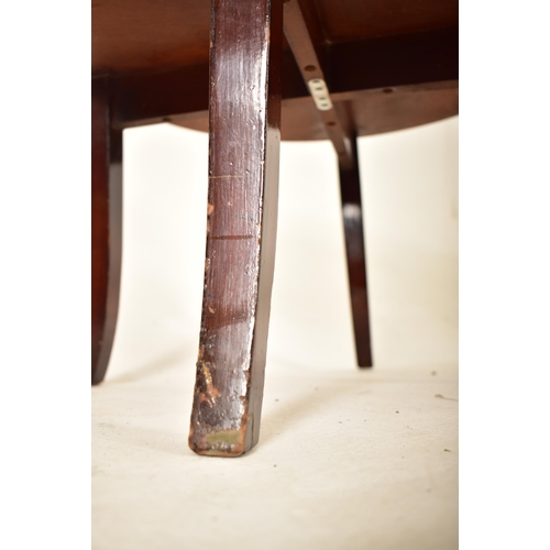 212 - A vintage mid 20th century circa 1950s walnut veneered circular low occasional coffee table. The tab... 