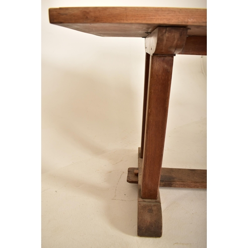 220 - A retro 20th century solid elm wood refectory farmhouse dining table. The table having a rectangular... 