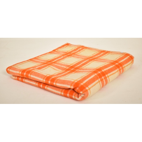 223 - Meirion Mill Ltd - A vintage 20th century hand made woollen traditional Welsh blanket. Orange and cr... 