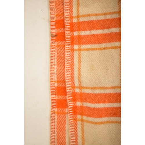 223 - Meirion Mill Ltd - A vintage 20th century hand made woollen traditional Welsh blanket. Orange and cr... 