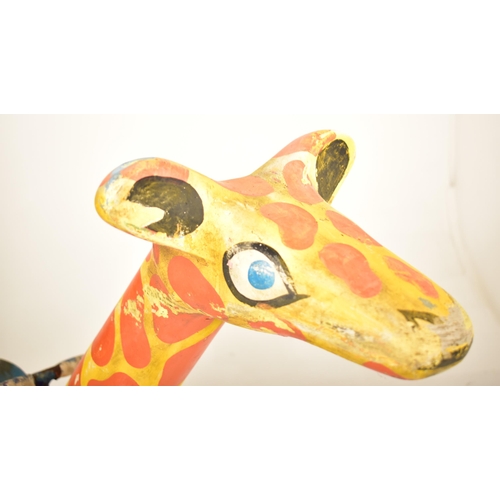 225 - Giraffe Juvenile Ride - A 20th century juvenile fairground / funfair carousel ride in the form a Gir... 