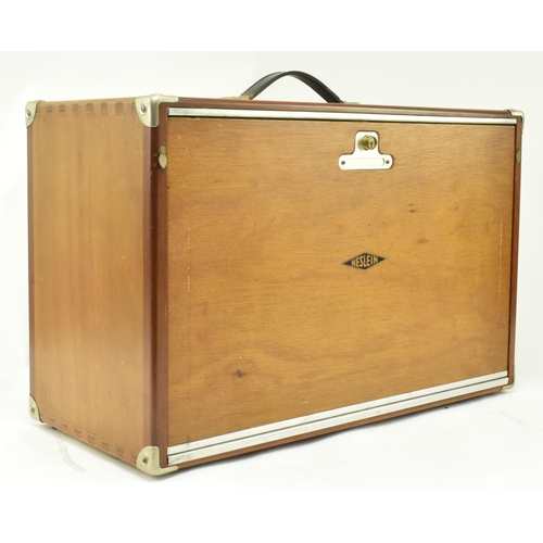 228 - A retro 20th century wooden Neslein engineers / workman's tool box. The box having a strap handle at... 