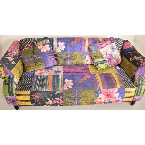 230 - Anna Fabric - A contemporary designer three seater sofa settee. The sofa having velvet patchwork sty... 