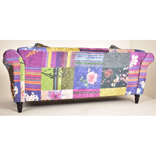 230 - Anna Fabric - A contemporary designer three seater sofa settee. The sofa having velvet patchwork sty... 