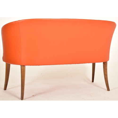 235 - Manner of Ole Wanscher - A contemporary designer Danish influenced two seater sofa settee. The sofa ... 