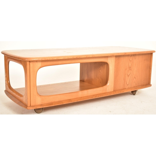 25 - Lucian Ercolani for Ercol - Minerva - A retro 1970s solid elm coffee table / low table. The table of... 