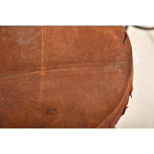 276 - A set of four retro 20th century suede leather & wrought iron bar stools. Each having a circular pad... 