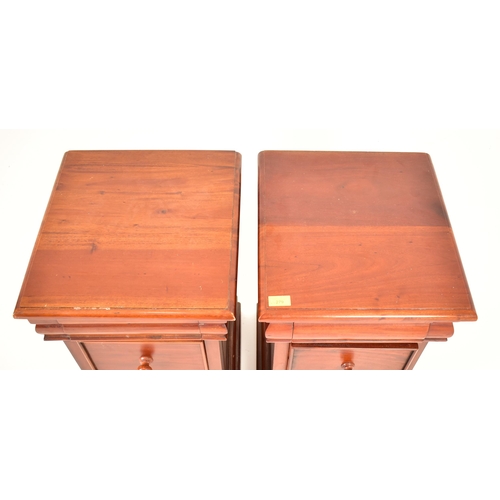 279 - Ancient Mariners Furniture - A pair of vintage late 20th century mahogany bedside chests in the mann... 