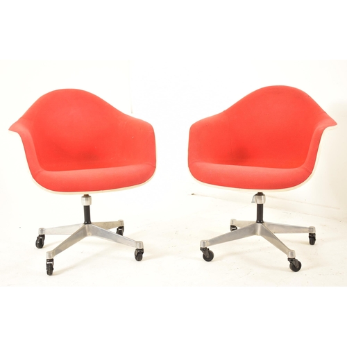 28 - RM & V - A matching pair of retro 20th century fiberglass and red fabric upholstered designer chairs... 