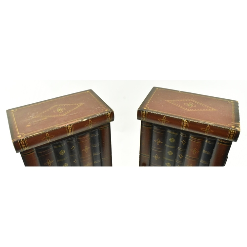 289 - A pair of vintage 20th century wall hanging cupboards in the shape of stack of books. Each having a ... 