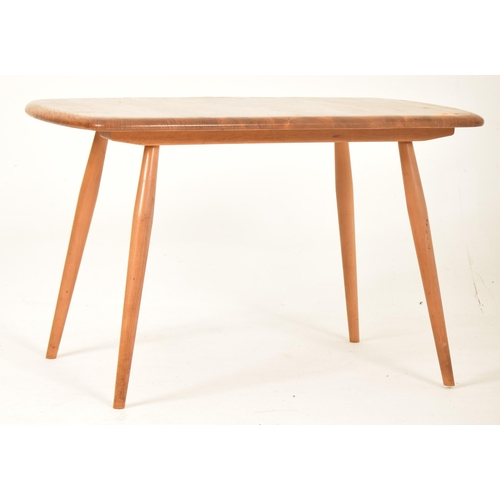 38 - Ercol - British Modern Design - A retro mid century elm wood plank coffee / occasional low table. Th... 