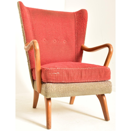 42 - Howard Keith - Parnass - A retro mid 20th century wing backed easy / lounge chair / armchair. The ch... 
