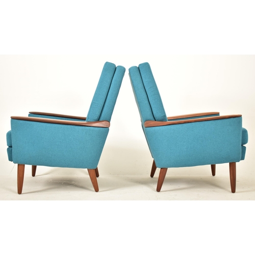 440 - Greaves & Thomas - A pair of retro 20th century circa 1970s teak easy lounge armchairs / chairs. Eac... 