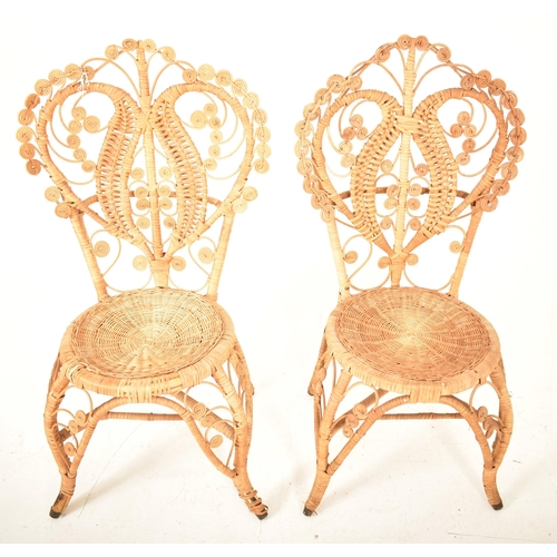 442 - Pons Leyva - A pair of retro mid 20th century Spanish bamboo and wicker woven peacock chairs. Each c... 