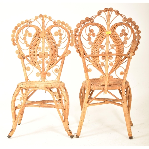 442 - Pons Leyva - A pair of retro mid 20th century Spanish bamboo and wicker woven peacock chairs. Each c... 