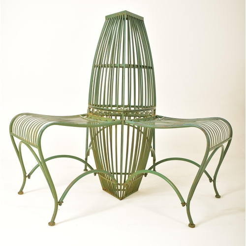 443 - A contemporary Victorian style three seater garden bench of wrought iron construction. Spindle back ... 