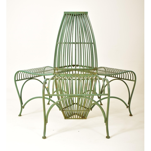 443 - A contemporary Victorian style three seater garden bench of wrought iron construction. Spindle back ... 