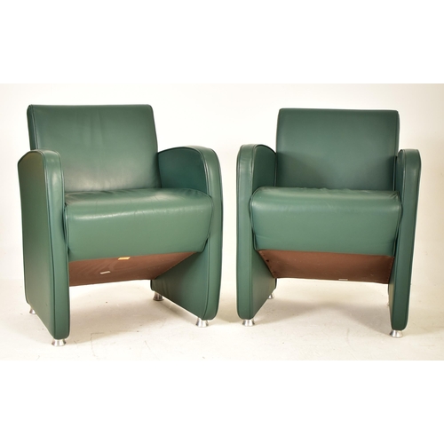 448 - A pair of retro 20th century Art Deco inspired green leather tub lounge armchairs. Each chair having... 