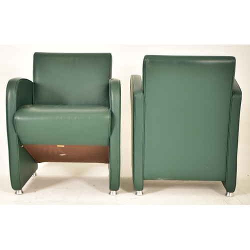 448 - A pair of retro 20th century Art Deco inspired green leather tub lounge armchairs. Each chair having... 