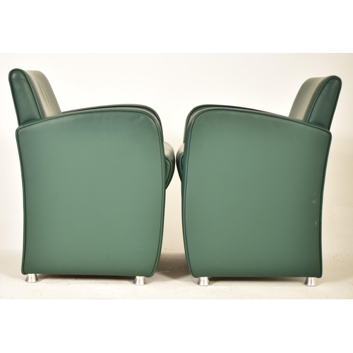 448 - A pair of retro 20th century Art Deco inspired green leather tub lounge armchairs. Each chair having... 