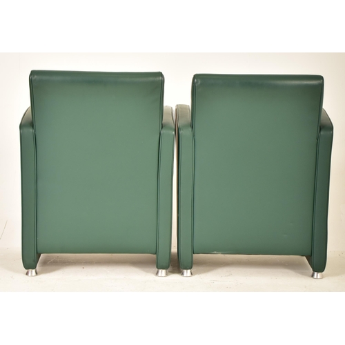 448 - A pair of retro 20th century Art Deco inspired green leather tub lounge armchairs. Each chair having... 