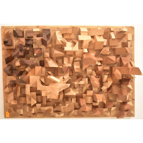 450 - An unusual vintage 20th century woodworked geometric panelled wall hanging. The wall hanging artwork... 