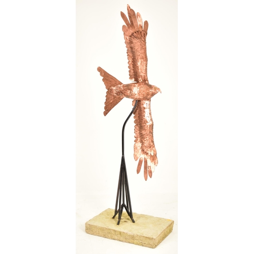 50 - Bob Rowley - A contemporary highly detailed copper worked sculpture depicting a Red Kite bird in fli... 