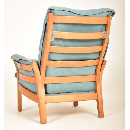528 - Ercol - A contemporary Renaissance pattern beech & elm armchair / easy lounge chair. Ladder backrest... 