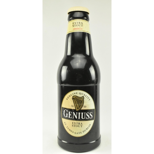 53 - Geniuss Extra Stout - A large contemporary adverting Geniuss money bank in the form of a bottle of G... 