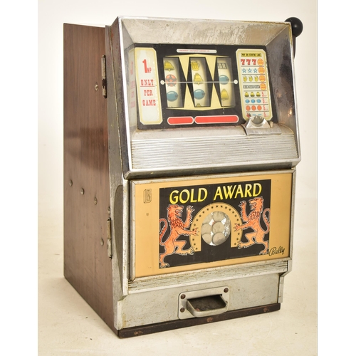 56 - Bally - A retro 20th century 1970s fruit machine / slot machine / one armed bandit by Bally, titled ... 
