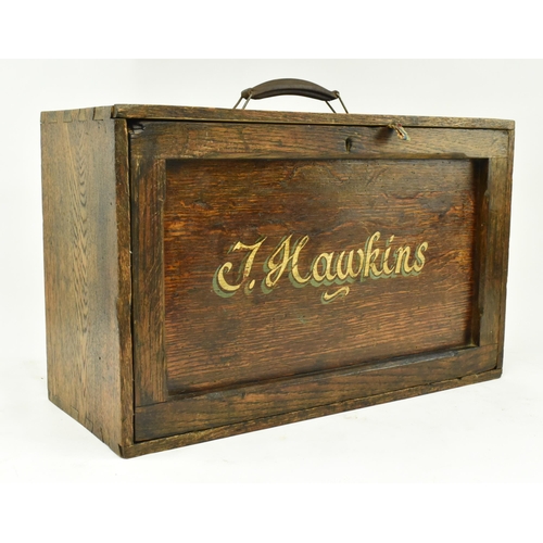 59 - A vintage 20th century oak cased engineers / workman's tool chest. The chest having a leather handle... 