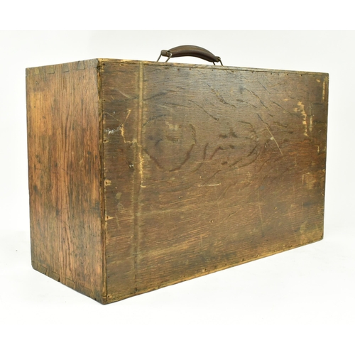 59 - A vintage 20th century oak cased engineers / workman's tool chest. The chest having a leather handle... 