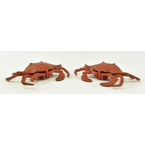 64 - A pair of mid 20th century circa 1950s novelty crab inkwells. Each of typical form with lift up shel... 