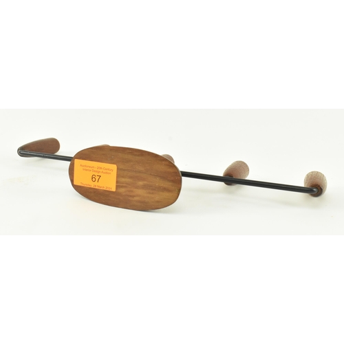 67 - Danish Modern Designs - A vintage mid 20th century circa 1960s five arm wood & iron Luthje candlesti... 