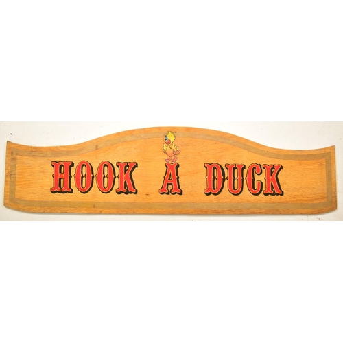 73 - Hook A Duck - A 20th century fairground / funfair amusement park painted sign pediment. Shaped form ... 