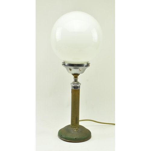 74 - A vintage 20th century Art Deco industrial desk / table lamp light. The lamp having a large globe op... 