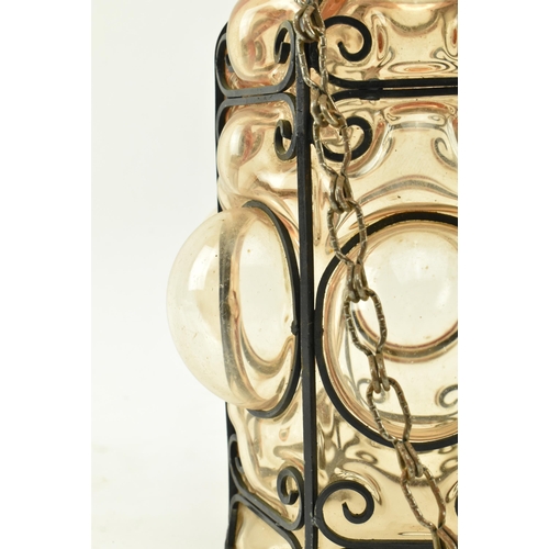 76 - A French inspired early 20th century amber hand blown glass bubble porch lantern light. The lantern ... 