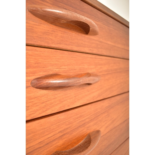 78 - Avalon Furniture - A retro 20th century 1970s designer teak chest of drawers. The chest having a ban... 