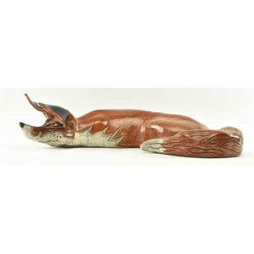 8 - Jennie Hale (British) - A large 20th century crackle glazed ceramic sculpture of a fox. The fox figu... 